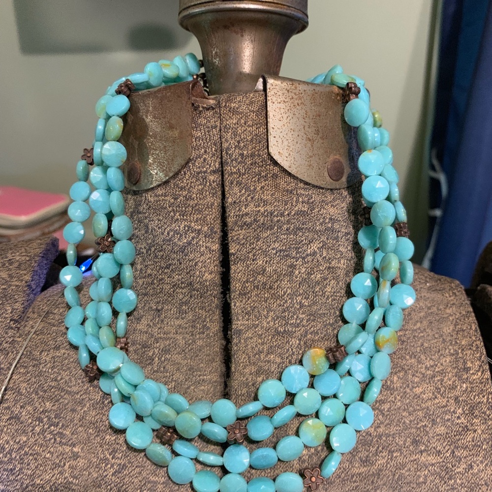 Turquoise-colored quadruple strand necklace!